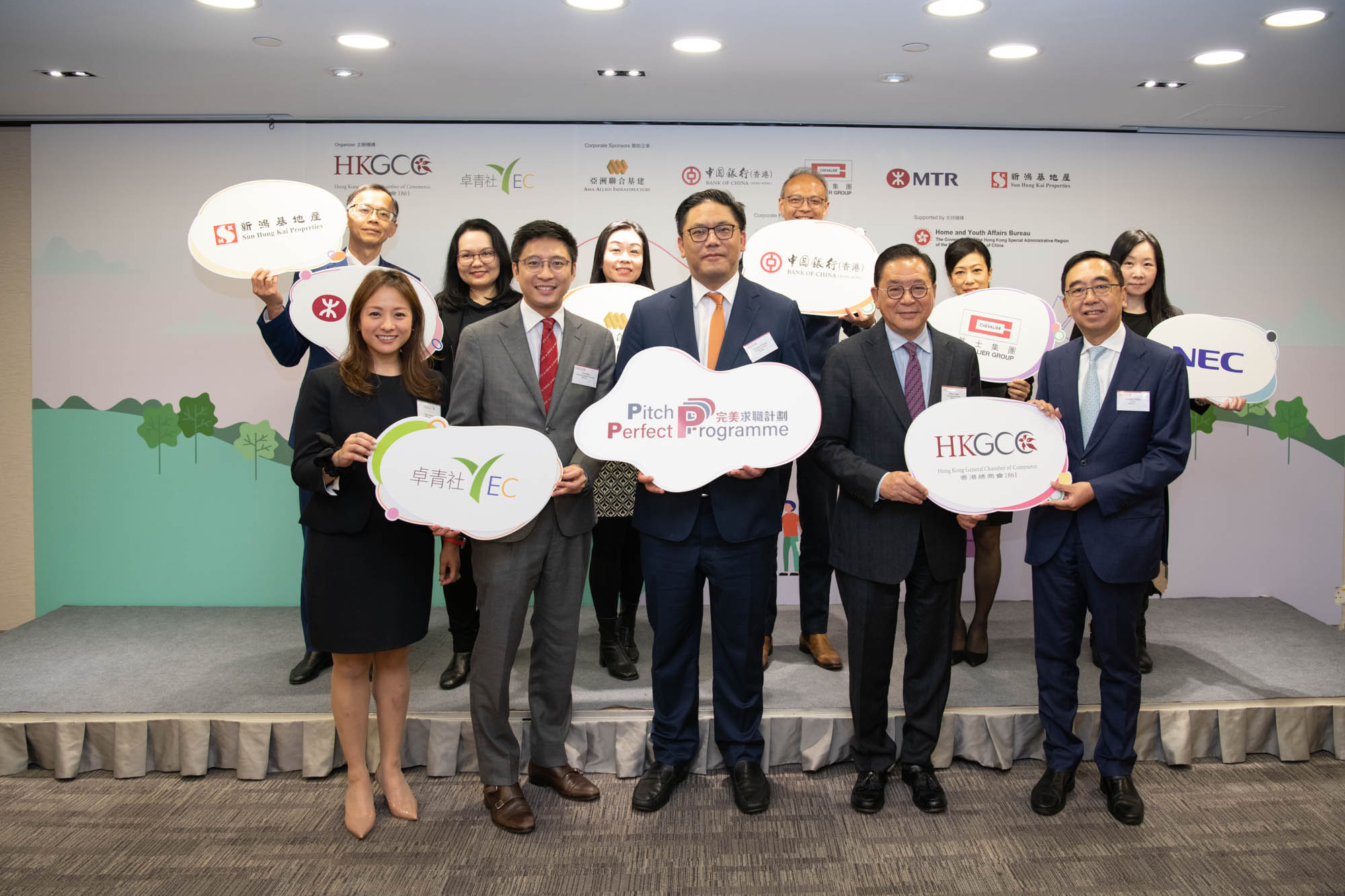 Clarence Leung, Under Secretary for Home and Youth Affairs, organizers and sponsors of 2023 HKGCC Pitch Perfect Programme pose for a group photo.